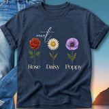 Navy t-shirt with "meet Rose Daisy Poppy" text and floral illustrations.
