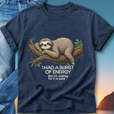 Navy t-shirt with a sloth resting on a branch, text reads "I had a burst of energy but I'm waiting for it to pass".