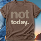 Brown t-shirt with "not today." text, worn over jeans.