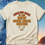 Cream t-shirt with "Circling Back is the New Duck Duck Goose" text and duck graphic.