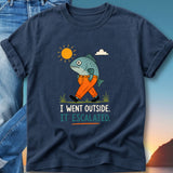 T-shirt with a cartoon fish in pants walking in the sun.