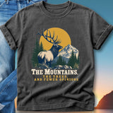 Dark t-shirt with elk, mountains, trees, and text "The Mountains, The Trees, And Fewer Opinions."