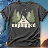 T-shirt with "unplugged" text, a plug on a road, and pine trees.