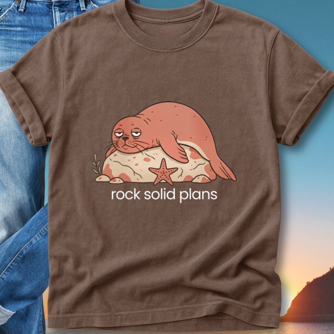 Brown t-shirt with cartoon seal and starfish illustration, text "rock solid plans".