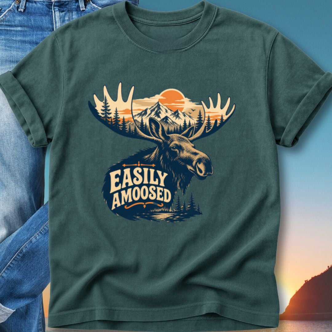 T-shirt graphic with moose, mountains, and sun, reading "Easily Amoosed."