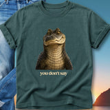 Teal t-shirt featuring a close-up of a crocodile with the text "you don't say".