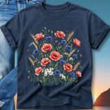 Navy blue t-shirt with a watercolor floral design of poppies, cornflowers, and wheat.